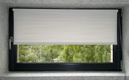 Roller,Blinds,Closeup,On,The,Window,In,The,Bathroom,,Trees